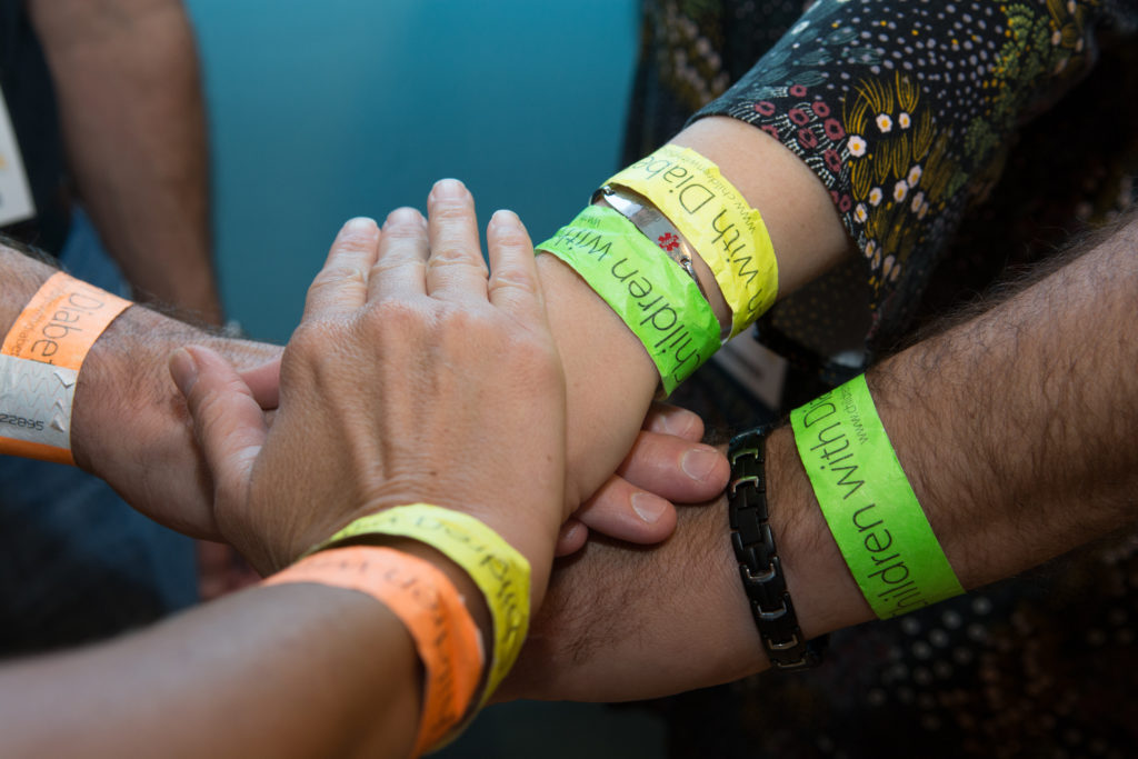 green bracelet orange bracelet group photo